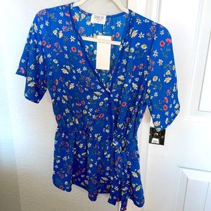 Sienna sky floral wrap blouse size M
